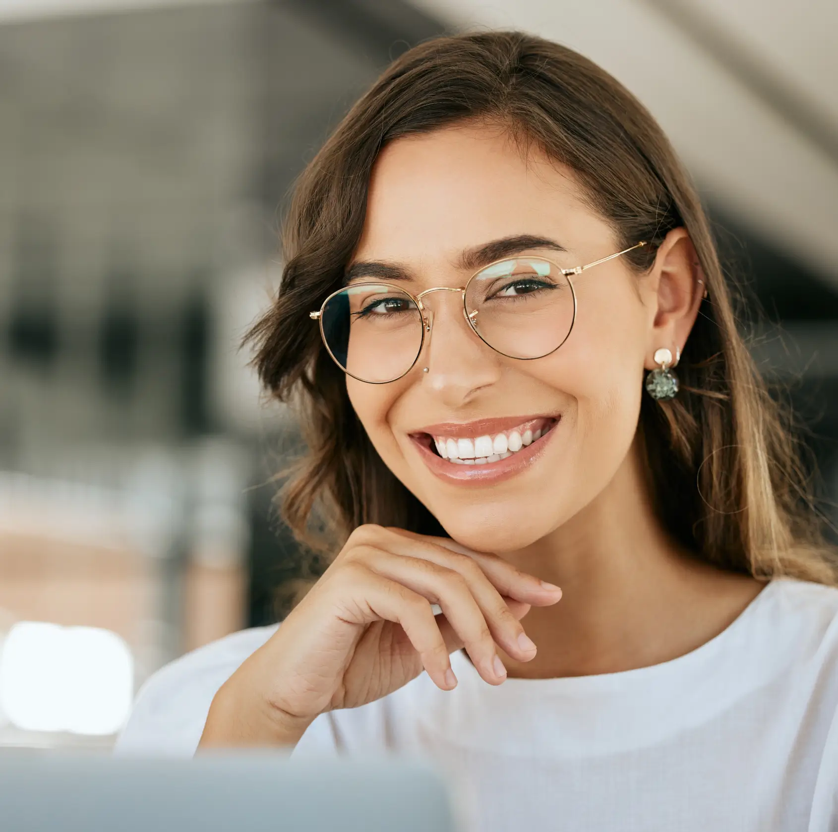 A smiling patient at Sunrise Dental in Richardson, TX